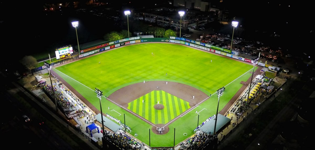 The baseball field at night uses LED lighting