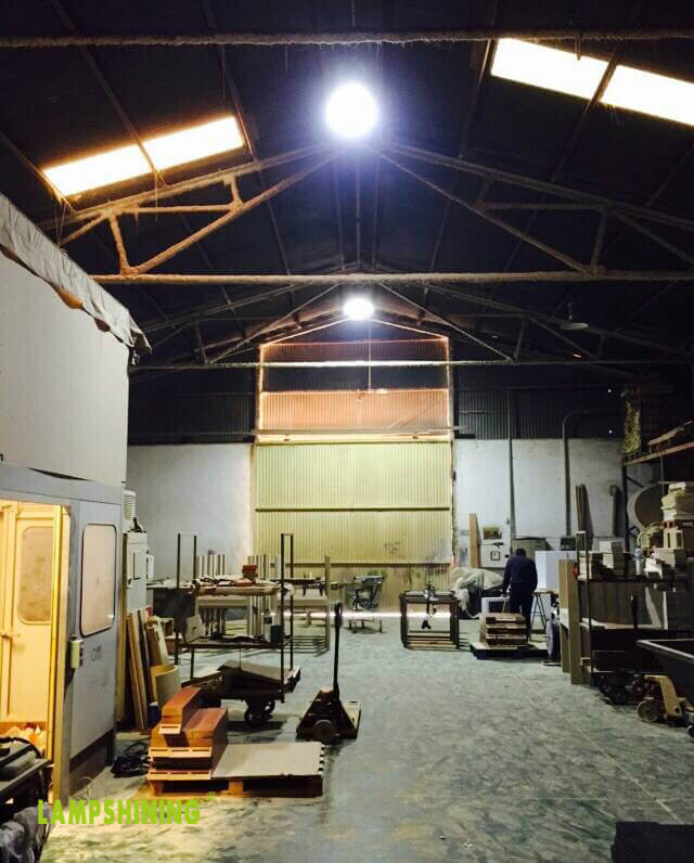 100W LED Corn Bulb installed in high bay fixtures for factory floor lighting